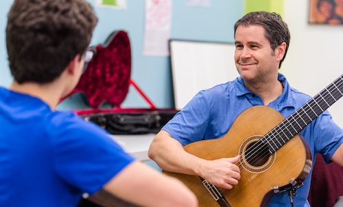 Levine faculty member Douglas Rogers teaches a lesson.